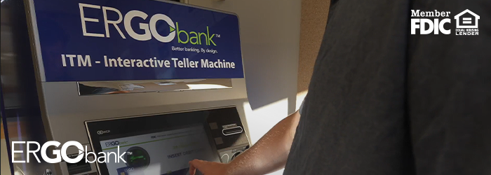 Man at Ergo Bank ITM pushing a button the screen