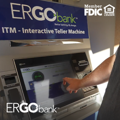 Man at Ergo Bank ITM pushing a button the screen