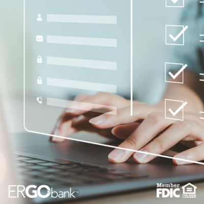 Person typing on a laptop with a screen hovering above to show they are adding contact information for a person