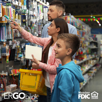 Mom and son picking out school supplies at the store