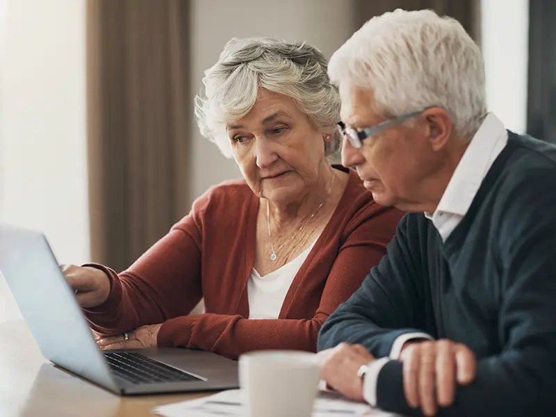 couple with laptop